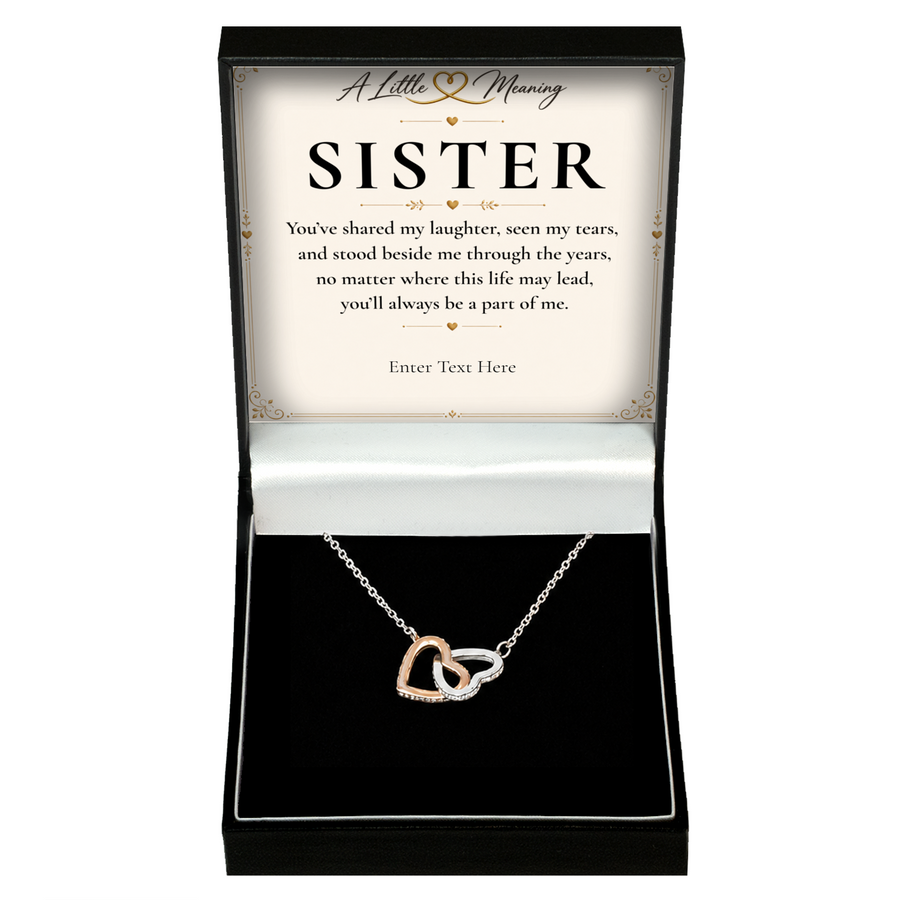 The Heart to Heart Sister Necklace: two-tone interlocking hearts pendant in a gift box with a personalised message card