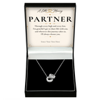 The Trinity Partner Necklace: Trinity ring pendant in a gift box with a personalised message card