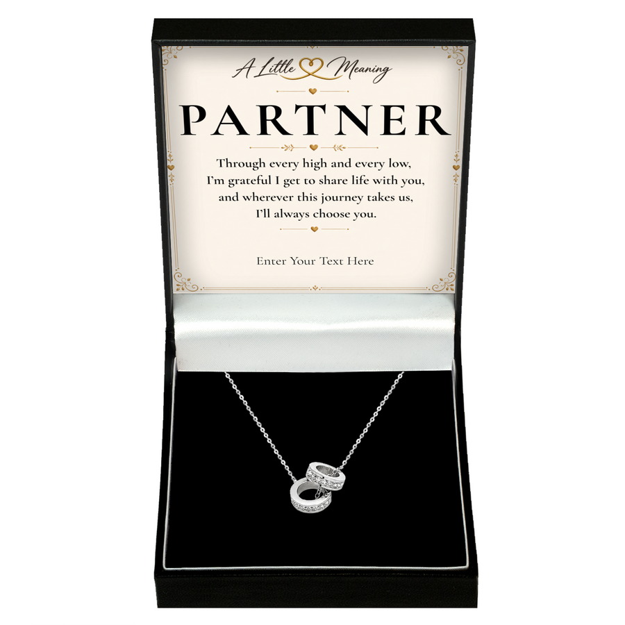 The Trinity Partner Necklace: Trinity ring pendant in a gift box with a personalised message card