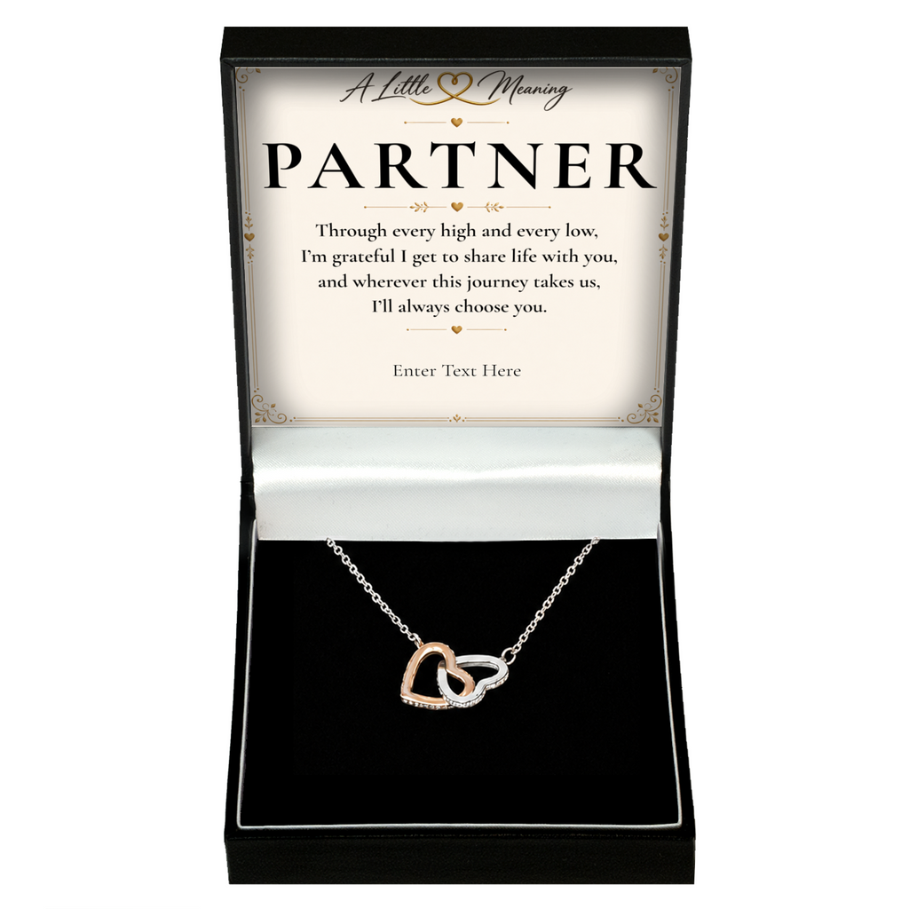 The Heart to Heart Partner Necklace: two-tone interlocking hearts pendant in a gift box with a personalised message card