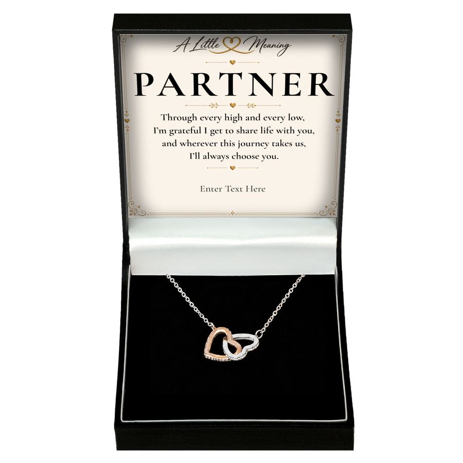 The Heart to Heart Partner Necklace: two-tone interlocking hearts pendant in a gift box with a personalised message card